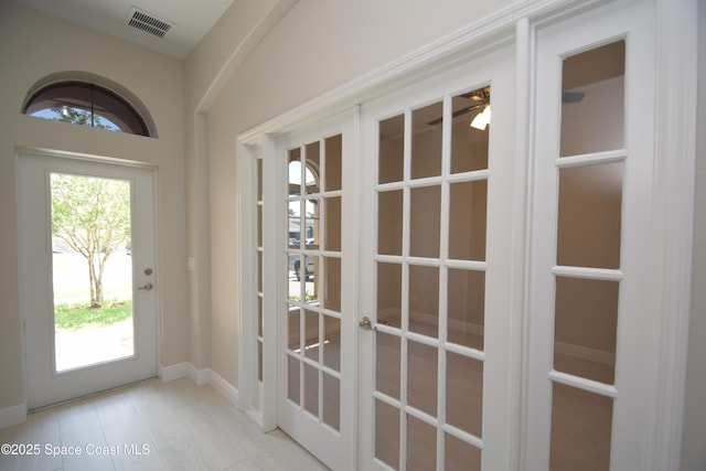doorway featuring french doors