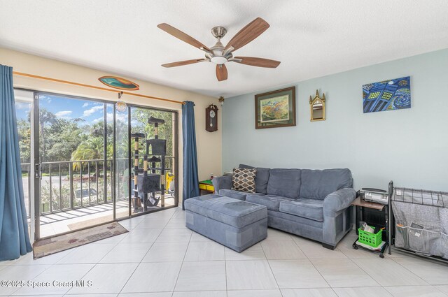 tiled living area with a ceiling fan