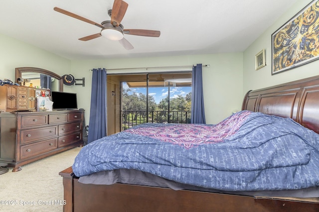 carpeted bedroom with access to outside and a ceiling fan