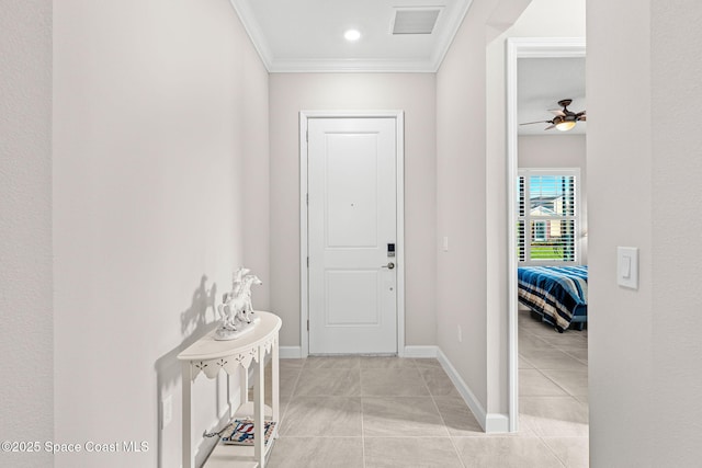 2162 Great Belt Cir, Melbourne, FL 32940 - foyer featuring ornamental molding, a ceiling fan, light tile patterned flooring, and baseboards