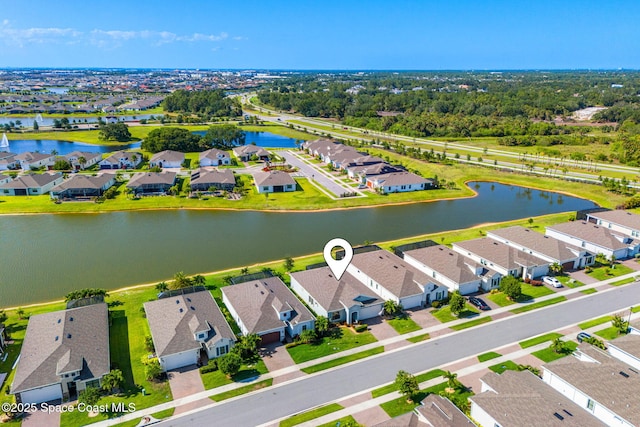 2162 Great Belt Cir, Melbourne, FL 32940 - aerial perspective of suburban area with a large body of water