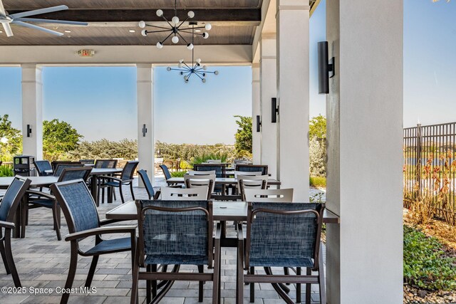 2162 Great Belt Cir, Melbourne, FL 32940 - view of patio featuring ceiling fan and outdoor dining area