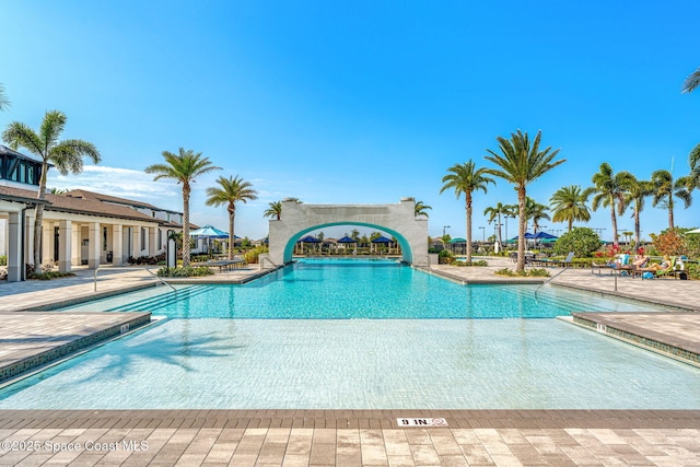 2162 Great Belt Cir, Melbourne, FL 32940 - community pool with a patio area