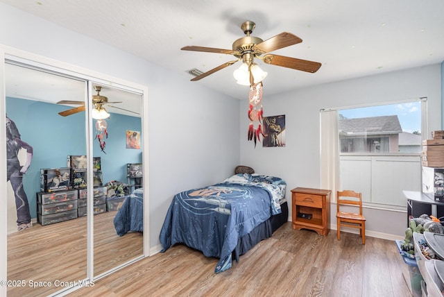4465 Everglades St, Cocoa, FL 32927 - bedroom featuring wood finished floors, a closet, a ceiling fan, and baseboards
