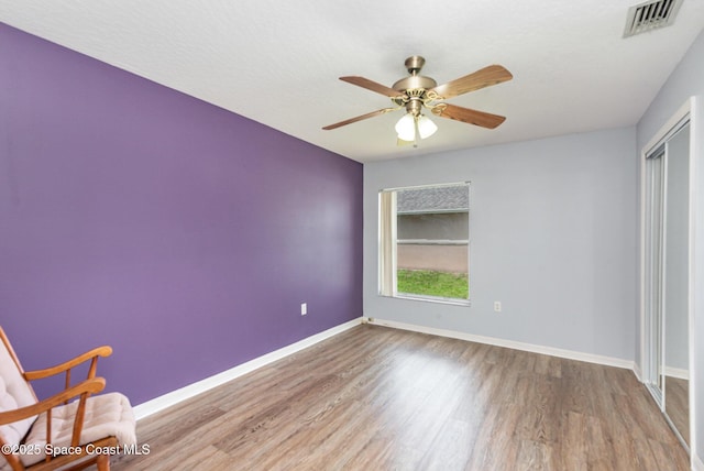 4465 Everglades St, Cocoa, FL 32927 - unfurnished room featuring wood finished floors, baseboards, and a ceiling fan