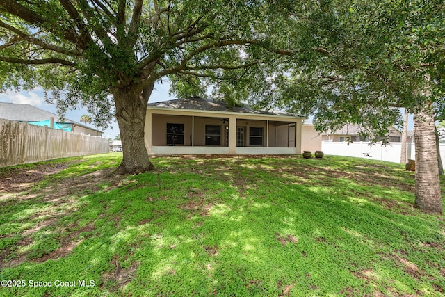 4465 Everglades St, Cocoa, FL 32927 - rear view of house featuring a sunroom