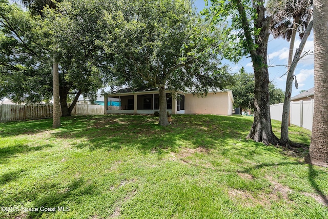 4465 Everglades St, Cocoa, FL 32927 - view of yard with a sunroom