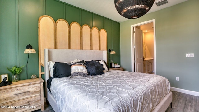 1272 Miraflores Trl NW, Palm Bay, FL 32907 - bedroom with wood finished floors and baseboards
