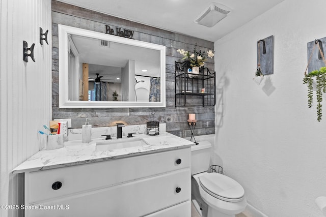 261 Cape Shores Cir Unit 18-E, Cape Canaveral, FL 32920 - bathroom with toilet and vanity