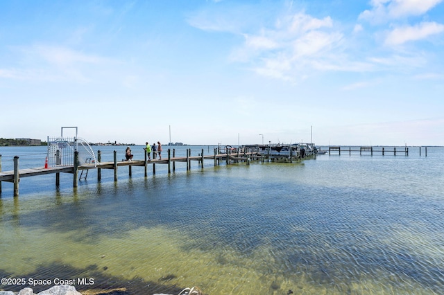 261 Cape Shores Cir Unit 18-E, Cape Canaveral, FL 32920 - dock area with a water view and boat lift