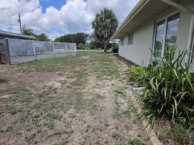 7181 Blue Shore Rd, Grant, FL 32949 - view of yard featuring fence