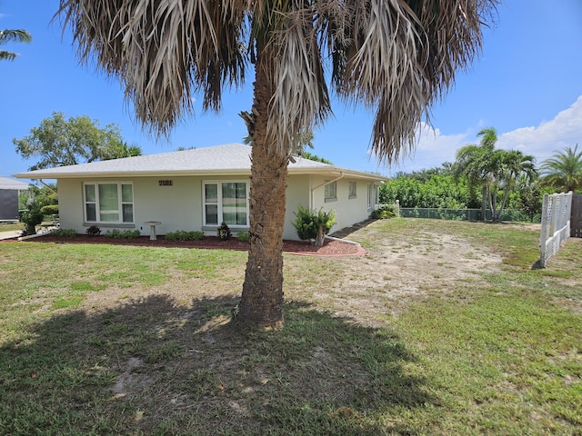 7181 Blue Shore Rd, Grant, FL 32949 - view of front of house featuring stucco siding