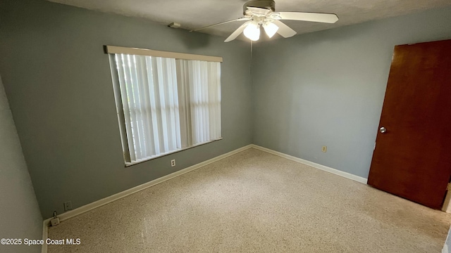 7181 Blue Shore Rd, Grant, FL 32949 - carpeted spare room featuring ceiling fan and baseboards