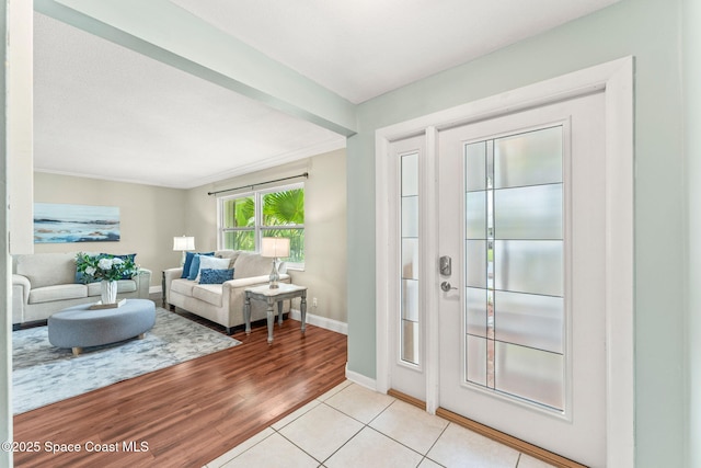 1675 Vega Ave, Merritt Island, FL 32953 - entrance foyer featuring baseboards and light wood-style floors