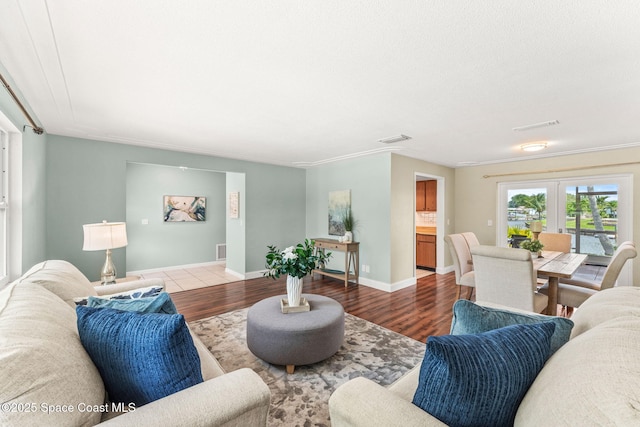 1675 Vega Ave, Merritt Island, FL 32953 - living area featuring wood finished floors, french doors, and baseboards