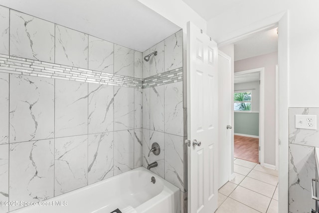 1675 Vega Ave, Merritt Island, FL 32953 - full bathroom with bathing tub / shower combination, tile patterned flooring, and baseboards