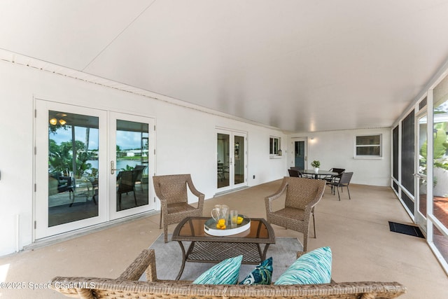 1675 Vega Ave, Merritt Island, FL 32953 - sunroom / solarium featuring french doors