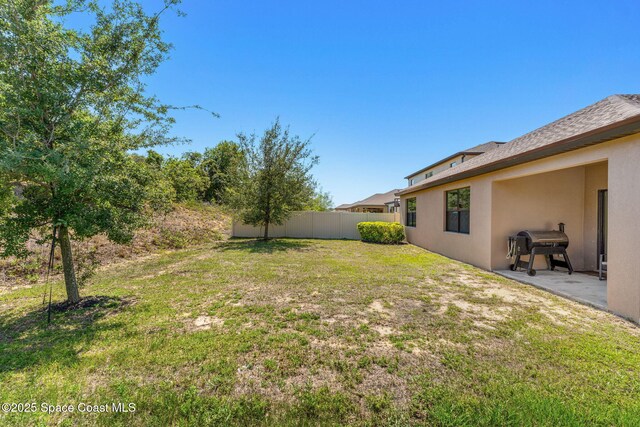 369 Coyote Dr, Cocoa, FL 32927 - view of yard featuring a patio