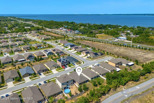 369 Coyote Dr, Cocoa, FL 32927 - aerial view of residential area with a large body of water
