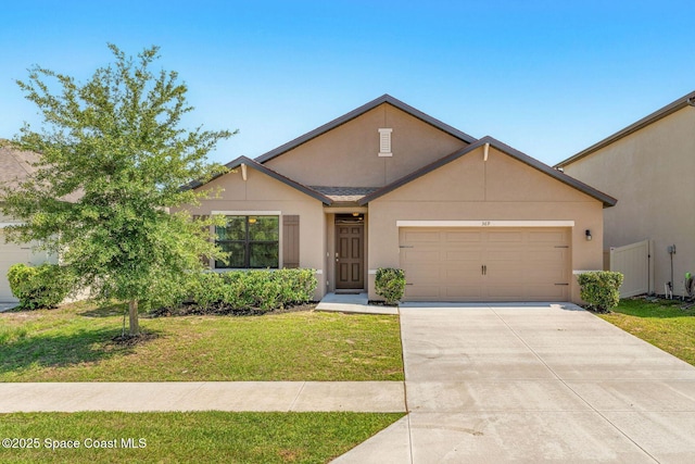 369 Coyote Dr, Cocoa, FL 32927 - traditional home featuring a front lawn, concrete driveway, a garage, and stucco siding