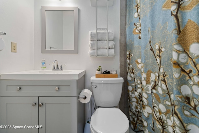 326 Pierce Ave, Cape Canaveral, FL 32920 - bathroom featuring toilet and vanity