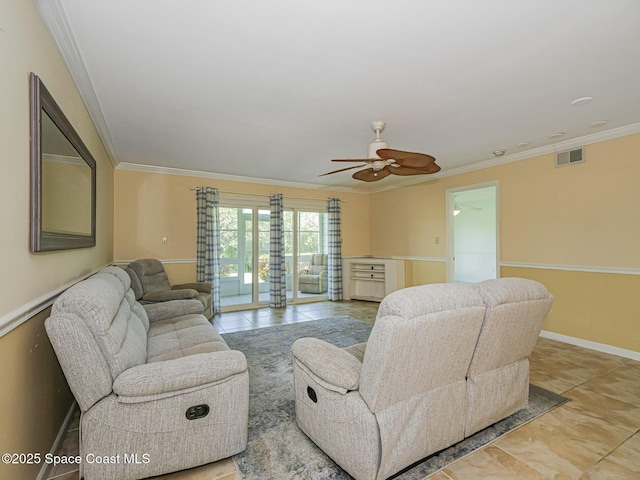 5720 Marina Dr Unit 2, Sebastian, FL 32958 - living room with crown molding, light tile patterned floors, a ceiling fan, and baseboards