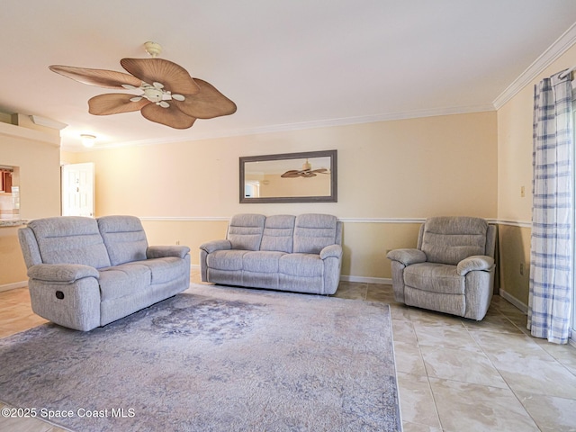 5720 Marina Dr Unit 2, Sebastian, FL 32958 - living room featuring ornamental molding, light tile patterned floors, baseboards, and a ceiling fan