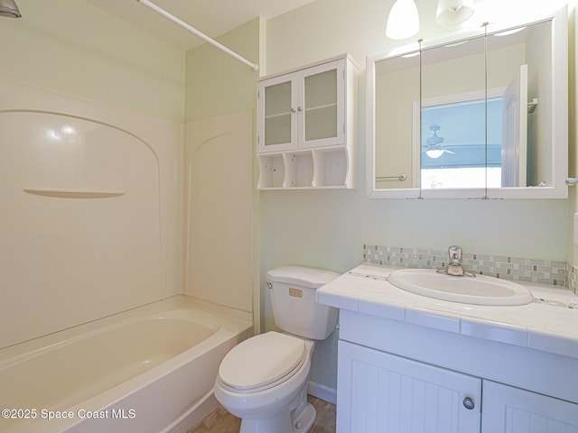 5720 Marina Dr Unit 2, Sebastian, FL 32958 - bathroom with toilet, vanity, and  shower combination