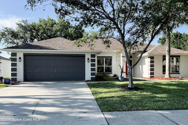 ranch-style home with stucco siding, driveway, a front lawn, a garage, and roof with shingles