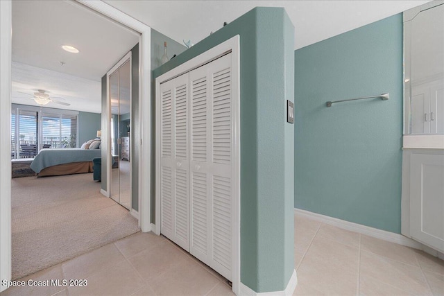 3360 S Atlantic Ave Unit 301, Cocoa Beach, FL 32931 - hall with baseboards and light tile patterned flooring