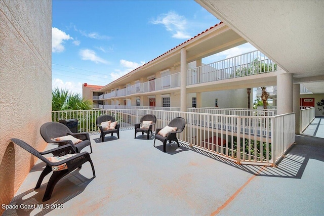 3360 S Atlantic Ave Unit 301, Cocoa Beach, FL 32931 - view of patio / terrace featuring a balcony