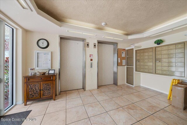 3360 S Atlantic Ave Unit 301, Cocoa Beach, FL 32931 - building lobby featuring a textured ceiling