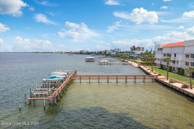 3360 S Atlantic Ave Unit 301, Cocoa Beach, FL 32931 - dock with a water view and boat lift