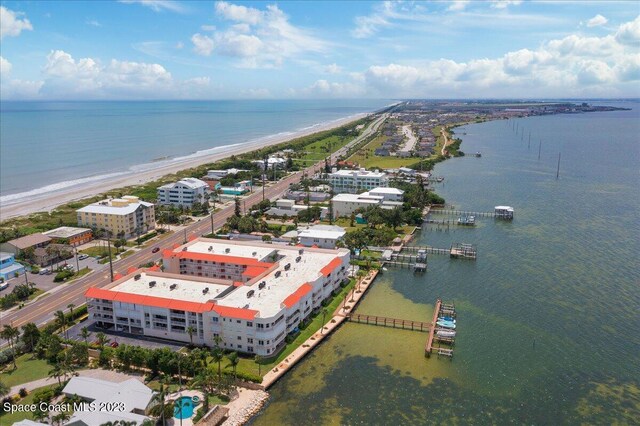 3360 S Atlantic Ave Unit 301, Cocoa Beach, FL 32931 - bird's eye view of expansive coastline and apartment complex