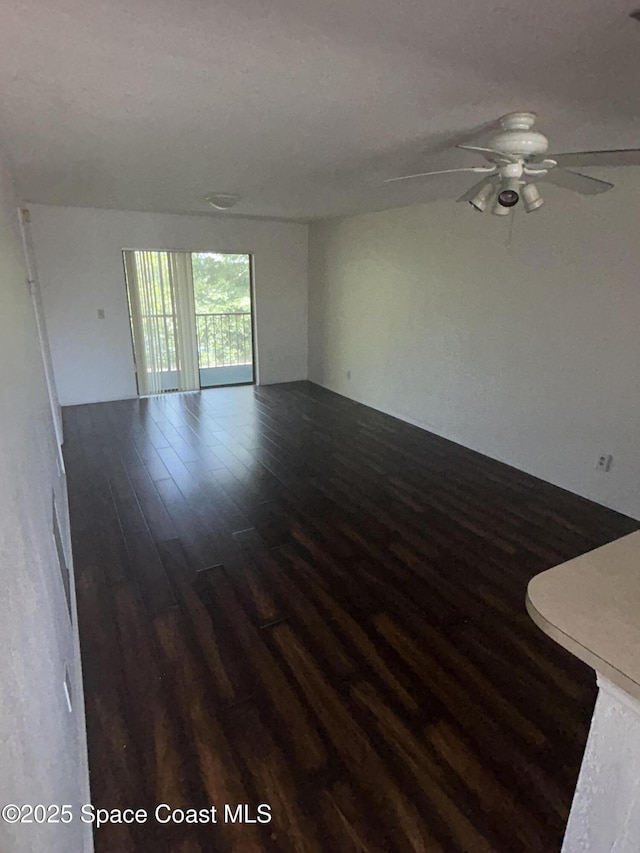1602 University Ln Unit 1307, Cocoa, FL 32922 - unfurnished room featuring wood finished floors and ceiling fan