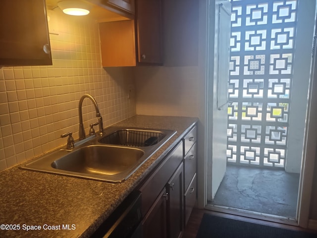 8401 N Atlantic Ave Unit G2, Cape Canaveral, FL 32920 - kitchen with a sink, tasteful backsplash, and fridge