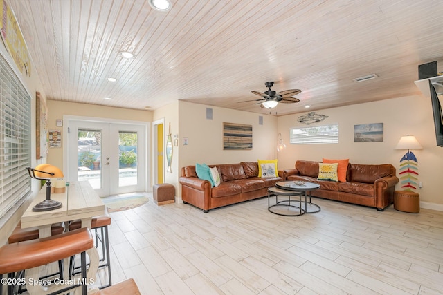 303 Winslow Cir, Cocoa Beach, FL 32931 - living area with healthy amount of natural light, light wood-style flooring, wood ceiling, ceiling fan, and recessed lighting