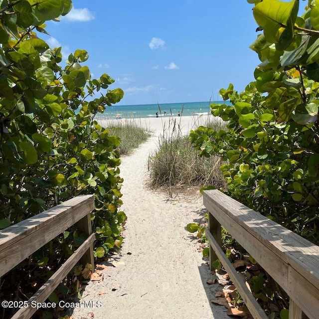 303 Winslow Cir, Cocoa Beach, FL 32931 - water view featuring local beach