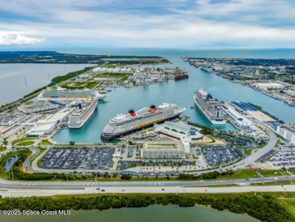 303 Winslow Cir, Cocoa Beach, FL 32931 - aerial view of a large body of water and numerous boat docks