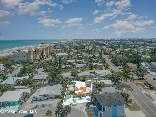 303 Winslow Cir, Cocoa Beach, FL 32931 - aerial view of property's location with property parcel outlined and a large body of water