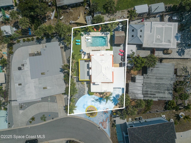 303 Winslow Cir, Cocoa Beach, FL 32931 - aerial view of property's location with property boundaries highlighted and a pool