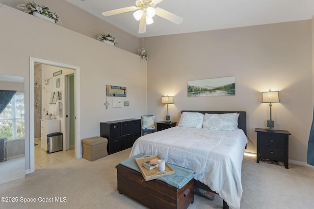 401 Trotter Ln Unit 202, Melbourne, FL 32940 - bedroom with light colored carpet, baseboards, and ceiling fan