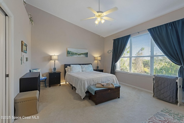 401 Trotter Ln Unit 202, Melbourne, FL 32940 - bedroom featuring lofted ceiling, carpet, baseboards, and a ceiling fan