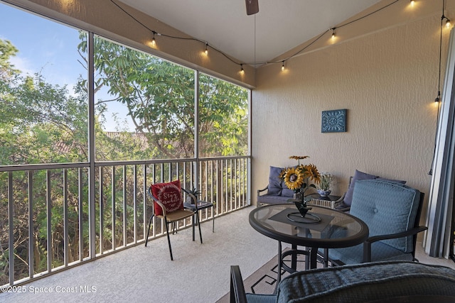 401 Trotter Ln Unit 202, Melbourne, FL 32940 - sunroom featuring track lighting and a ceiling fan