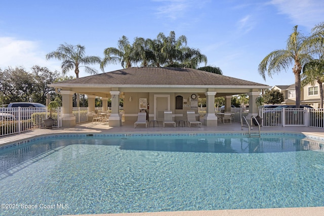 401 Trotter Ln Unit 202, Melbourne, FL 32940 - community pool with fence and a patio