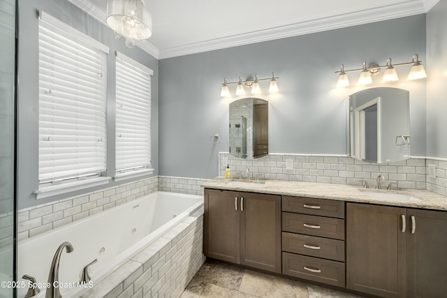 4070 S Tropical Trl, Merritt Island, FL 32952 - full bath with a whirlpool tub, crown molding, double vanity, and backsplash