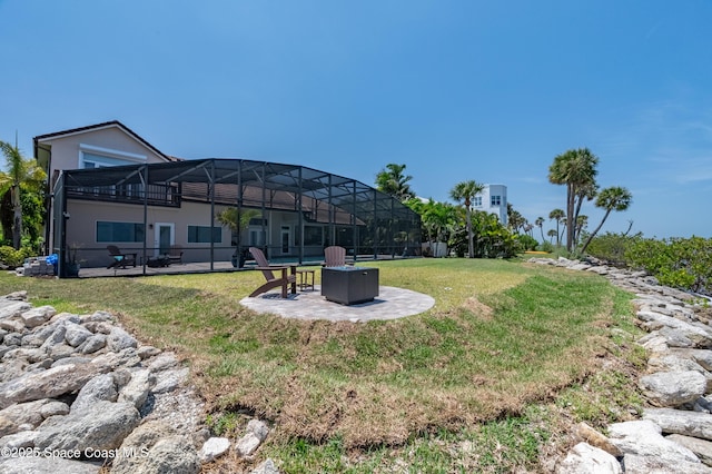 4070 S Tropical Trl, Merritt Island, FL 32952 - view of grassy yard with a patio and a lanai