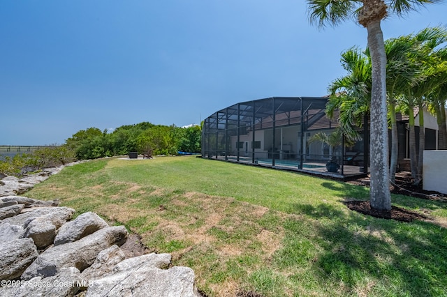 4070 S Tropical Trl, Merritt Island, FL 32952 - view of green lawn featuring an outdoor pool and glass enclosure