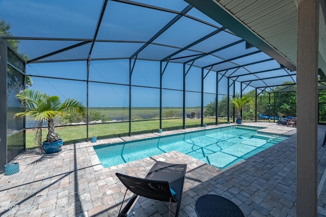 4070 S Tropical Trl, Merritt Island, FL 32952 - outdoor pool featuring a patio and glass enclosure