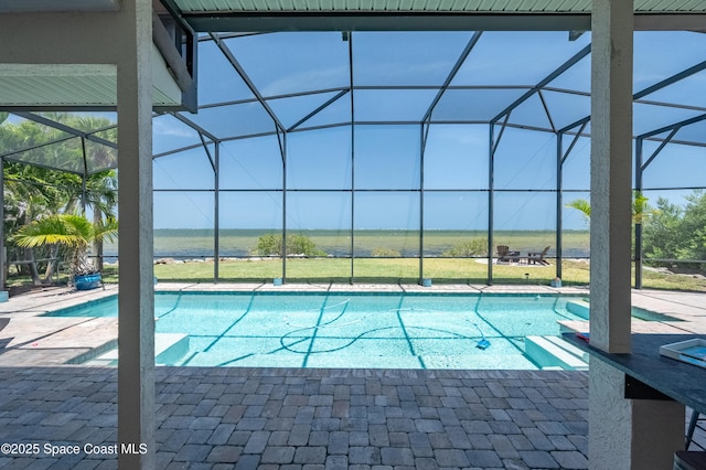 4070 S Tropical Trl, Merritt Island, FL 32952 - outdoor pool with glass enclosure and a patio